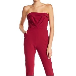 Adelyn Rae strapless pink cranberry red trouser leg jumpsuit with pockets
